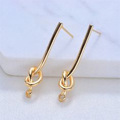 10pcs Real Gold Plated Long Bar Earring Stud,Ear Posts with Loop,Brass Earring Attachment Finding Wholesale 1.Size: 32 mm 2.Quantity: 10 pcs=5 pair 3.Material: Brass +Real Gold Plated + S925 silver Ear Stick If you have any questions,please contact me. Long Bar Earrings, Handmade Jewelry Findings, Stick Earrings, Knot Stud Earrings, Knot Studs, Earring Stud, Knot Earrings, Bar Earrings, Diy Schmuck