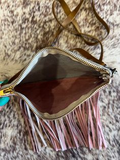 Mini Crossbody/Shoulder bag. Adjustable Strap. Brown cowhide with light pink leather and fringe. Leather Aztec print. Pink Fringe Bag For Daily Use, Pink Fringe Shoulder Bag, Pink Fringe Bag For Everyday Use, Pink Fringe Bag, Brown Cowhide, Spring Sale, Mini Crossbody, Aztec Print, Pink Leather