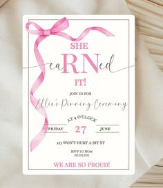 a pink ribbon is tied around the front of a card that says she learned it