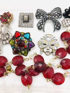 This listing is for a collection of broken jewelry. It is a mix up of vintage to new. It would be great for display or use for a project. Vintage Red Pins For Party, Red Retro Brooch Jewelry, Retro Red Brooch Jewelry, Vintage Red Jewelry With Rhinestones, Vintage Red Brooches For Party, Vintage Multicolor Rhinestones Brooches, Vintage Red Rhinestone Jewelry, Rhinestone Jewelry, Repurpose