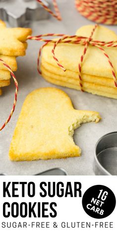 keto sugar cookies on a baking sheet with red twine