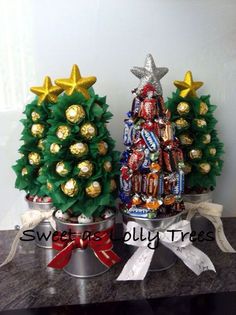 two christmas trees made out of candy bars