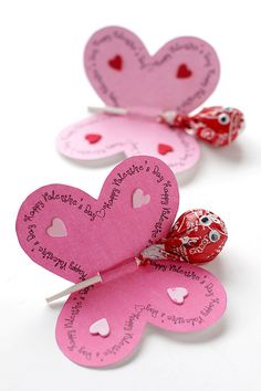 three valentine's day candy hearts on a white background with the words happy valentine's day written on them