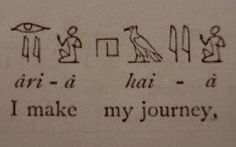 an egyptian writing with some symbols on it