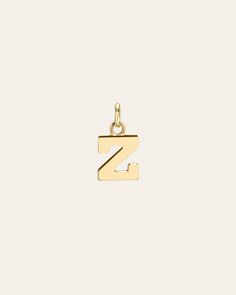 14k solid gold initial charm in a block font in the gold color of your choice (pendant only, does not include chain) wear it by itself or stacked with the charms of your choice, with your initial or your loved ones. Size of Initial: Approx. 5mm Size of Bail: Approx. 2mm(W) by 3mm(H) Weight: Approx. 1 gram Standard Production: 4-7 business days Rush Order Production: 2-4 business days Shipping: Select shipping method at checkout. Shipped from our L.A. Studio. This item is Final Sale. See here for 14k Gold Initial Pendant Charms For Anniversary, 14k Gold Anniversary Charms With Initial Pendant, Classic Initial Pendant Charm, 14k Yellow Gold Initial Pendant Charm, Yellow Gold 14k Initial Pendant Charms, Gold Initials Charms In 14k Gold, Personalized Yellow Gold Charms With Initial Pendant, 14k Gold Initials Charms, 14k Yellow Gold Initial Necklace With Charms