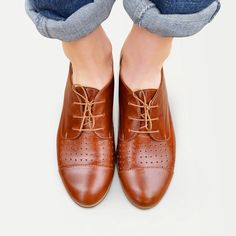 "This lace-up pair with hole-punch perforations, in a soft brown leather with seamed cap-toe, is a perfect choice for summer occasions. Slip them on to add an androgynous edge to city looks. Outer material - perforated leather, inner material - leather, closure - lace. Heel - 2.5 cm / 1.0\". --------Size Conversion & Feet Measurements-------- EU 34 US 4.0 UK 1.0 | 22.5 cm / 8.85\" EU 35 US 5.0 UK 2.0 | 23.0 cm / 9.05\" EU 36 US 6.0 UK 3.0 | 23.5 cm / 9.25\" EU 37 US 6.5 UK 4.0 | 24.5 cm / 9. Brown Shoes Aesthetic, Leather Oxfords Women, Brown Brogues, Saddle Shoes, Custom Made Shoes, Oxford Boots, Croc Leather, Brown Shoes, Shoes Brown