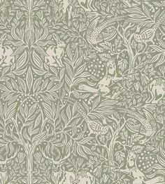 a green and white wallpaper with birds on it