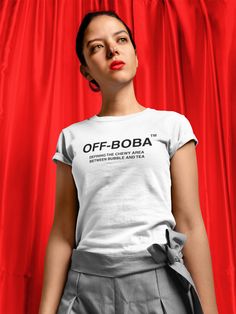 “BOBA” Move from the grey area between black and white to the chewy area between bubble and tea with this Off-Boba shirt. Be the envy of all the hypebeasts with this limited-edition shirt that celebrates both streetwear and boba. Featuring luxurious ring spun cotton and double stitched seams, this unisex Off-Boba shirt is a great flex for drop days as you sip on boba from a Pyrex straw and stare at all the hypebeasts who’ve been camping out in line since 5 in the morning while you watch them from your boba shop. And with all the money you’ll save buying this shirt instead of the latest Supreme X LV X CDG X Sesame Street X Pampers collab, you can treat yourself to a boba …or 100. We've designed this shirt so that it fits beautifully whether you’re had a KBBQ food baby or you’ve all about th Boba Shop, Streetwear Apparel, Food Baby, Tea Shirt, Limited Edition Shirt, Boba Tea, Asian American, The Grey, Milk Tea