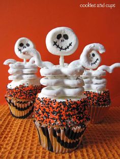 halloween cupcakes decorated with sprinkles and marshmallows