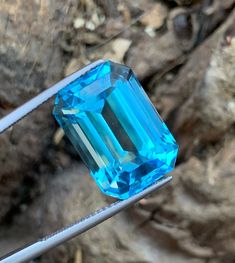 23.10 CT Swiss Blue Topaz Gemstone | Natural Unique Emerald Cut | Swiss Topaz For Ring | Stunning Blue Topaz | Bridal Ring | Loupe Clean Gem 𝐆𝐞𝐦𝐨𝐥𝐨𝐠𝐲; Dimensions: 18*13*11 mm Weight: 23.10 Carats Color: Swiss Blue Shape: Emerald Cut Clarity: Loupe Clean Quantity: 1 Luster: Vitreous Birthstone zodiac sign: Scorpio Associated month: November . 𝐅𝐑𝐄𝐄 𝐃𝐇𝐋 𝐄 𝐂𝐎𝐌𝐌𝐄𝐑𝐂𝐄 / 𝐅𝐑𝐄𝐄 𝐔𝐒𝐏𝐒 𝐒𝐇𝐈𝐏𝐏𝐈𝐍𝐆 . 𝗪𝗼𝗿𝗹𝗱𝘄𝗶𝗱𝗲 𝗦𝘁𝗮𝗻𝗱𝗮𝗿𝗱 𝗦𝗵𝗶𝗽𝗽𝗶𝗻𝗴 Certificate: On Cust Blue Faceted Gemstones For Anniversary, Gia Certified Blue Topaz Ring As Gift, Blue Topaz Gemstones With Accent Stones, Formal Blue Topaz Gemstones, Zodiac Sign Scorpio, Blue Topaz Gemstone, How To Look Handsome, Swiss Blue Topaz, Bridal Ring