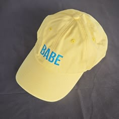 Babe Wine Branded Yellow Retro Looking Ball Cap Hat. These Are So Cute On, I Have Yet To See Someone Who Doesn't Look Good In One Of These Babies :) 1990s Style Cute Summer Dad Hat, Cute Dad Hat For Summer, Vintage Spring Dad Hat With Letter Print, Trendy Yellow Snapback Hat With Curved Brim, Vintage Letter Print Dad Hat For Spring, Spring Vintage Letter Print Dad Hat, Retro Adjustable Dad Hat For Summer, Trendy Yellow Snapback Dad Hat, Trendy Yellow Baseball Cap With Visor