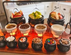 an assortment of desserts are displayed on a table