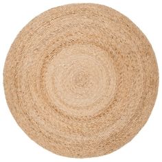 the round rug is made from jute and has been placed on top of a white surface