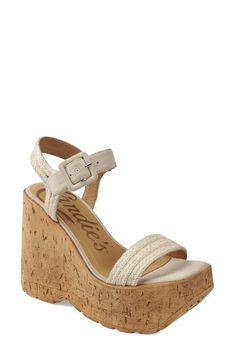 A cork-textured platform-wedge sole amplifies the earthy vibes of an outfit-making sandal topped with a woven ankle strap. 5" heel; 2" platform Adjustable ankle strap with buckle closure; hidden elastic inset Textile upper/leather lining/synthetic sole Imported Cork Wedge Heel Sandals For Vacation, Cork Wedge Sandals For Vacation, Cork Wedge Heel Sandals For Summer, Cork Wedge Sandals For Summer, Summer Cork Wedge Sandals, Spring Beach Wedge Sandals With Cork Material, Summer Ankle Strap Cork Sandals, Summer Cork Sandals With Ankle Strap, Spring Beach Cork Wedge Sandals