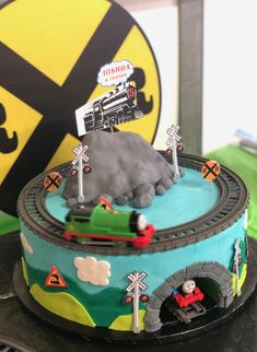 a birthday cake with a train on it