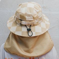 Beach Beige, for the not so beige beach babes. We want a surf hat that says “I’m more than Beige” and here it is.Checkered Beige Bucket hat in our classic design. Colour: Beige Checkers Beige Bucket Hat, Surf Hat, Beige Beach, Surf Hats, Bucket Hat Design, Surf Wear, Colour Beige, Swim Shop, Reduce Waste