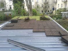 the roof of a building is covered with metal sheets