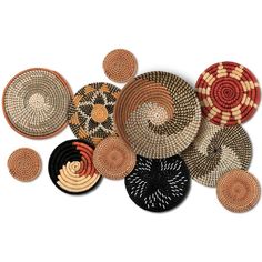 several woven baskets are arranged on the floor, with different colors and patterns in them