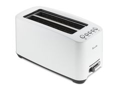 a white toaster sitting on top of a table