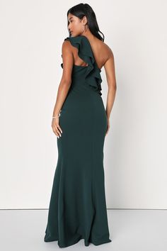 A chic-meets-elegant look is easy to achieve in the Lulus Grand Beauty Emerald Ruffled One-Shoulder Mermaid Maxi Dress! Stretchy, medium-weight crepe knit shapes this stylish gown with a tiered, ruffled one-shoulder sleeve that creates an asymmetrical neckline then carries into the darted bodice. High, fitted waist flows into a figure-flaunting maxi skirt finished with a flaring, mermaid hem. Hidden side zipper/clasp. Fit: This garment fits true to size. Length: Floor length. Size medium measure Elegant Green Mermaid Bridesmaid Dress, Elegant Green Bridesmaid Mermaid Dress, Elegant Bridesmaid Maxi Dress With Mermaid Hem, Elegant One Shoulder Bridesmaid Dress With Ruffles, Elegant One-shoulder Bridesmaid Dress With Ruffles, Elegant Green One-shoulder Dress For Date Night, Stylish Gown, Mermaid Maxi Dress, Lulu Fashion