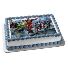 a birthday cake with an image of the avengers on it