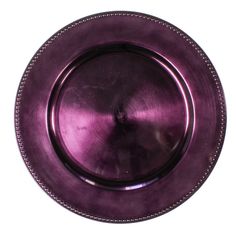 a purple plate with beaded edges on a white background