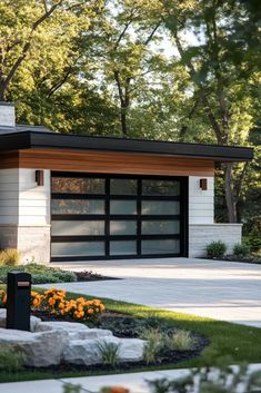 a modern house with an open garage door