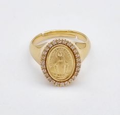 925 sterling silver, 18 K gold plated Virgin Mary Signet Band Ring is a style complement. Miraculous medal ring. All details have been considered to make it the most meaningful and eye-catching gift.  This piece of jewelry will give you special pleasure. Ring Weight: 7,70 grams Ring size: adjustable  the smallest size is : US:7-, EU:16 , Diameter 56 mm Can be expanded to larger sizes Virgin Mary Gold Ring, Adjustable Gold Sterling Silver Signet Ring, Adjustable Gold Oval Diamond Ring, Gold Sterling Silver Diamond Ring, Adjustable Gold Diamond Ring In Sterling Silver, Gold Sterling Silver Round Diamond Ring, Hallmarked Gold Signet Ring With Cubic Zirconia, Gold Hallmarked Cubic Zirconia Signet Ring, Gold Cubic Zirconia Hallmarked Signet Ring