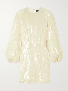 ROTATE Birger Christensen's 'Billiana' mini dress is drenched in clear sequins that create a glossy, almost liquid look. It's made from recycled-tulle and fully lined to temper the sheer finish. The billowy sleeves are fitted with elastic at the cuffs, so you'll feel free to move on the dancefloor. Glamorous Cream Mini Dress For Evening, Glamorous Cream Mini Dress For Night Out, Glamorous Cream Party Dress, Chic Champagne Mini Dress With Sequins, Luxury Sequined Winter Dress, Luxury Sequin Mini Dress, Luxury White Mini Dress With Sequins, 16arlington Sequin Dress, Rotate Birger Christensen Dress