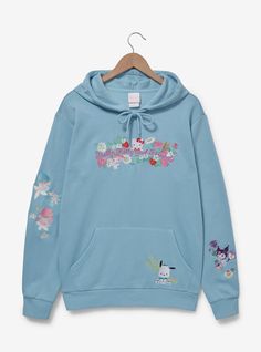 Your Sanrio style will blossom with this hoodie! Cozy sky blue fabric features embroidery of beloved Hello Kitty and Friends characters  including My Melody and Hello Kitty amid flowers and strawberries across the chest. Embellished with coordinated floral details  Kuromi sneaks onto one sleeve while Pochacco adorns the roomy front pocket. With a drawstring hood  this sweatshirt keeps you comfy and cute in any season.A BoxLunch Exclusive!52% cotton; 48% polyester Listed in unisex sizes Hello Kitty Clothing, Sanrio Hoodie, My Melody And Hello Kitty, Melody And Hello Kitty, Sanrio Jacket, Sanrio Merch, Sanrio Style, Pastel Clothes, Cool Sweatshirts