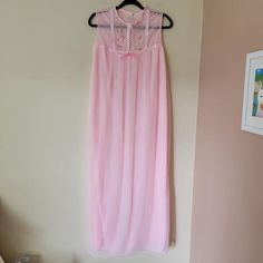 Vintage 60s Mod Nylon Tricot Chiffon Sleeveless Maxi Nightgown House Dress sz M - brand is Queentex  - made in Canada - 2 layers of lightweight pink nylon - lace, ribbon, and floral embroidery  - Size medium  Approx flat measurements- pit to pit 18.5", waist 20", length 50" Excellent used condition Shop Information: Worldwide shipping available. Please contact me for a shipping quote for: - orders outside of Canada/US - bundles of more than one item - overnight or expedited shipping Please read Maxi Nightgown, 60s Mod, House Dress, Nightgowns, Vintage Lingerie, Vintage 60s, Floral Embroidery, Unique Vintage, Night Gown