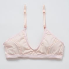 Playful and versatile, this bra is ready for all the adventures your day holds. Wear the convertible straps crossed in back or vertical to accommodate your favorite blouses—or to show off, if you choose. In lightweight, buttery-soft organic cotton. Supports A-C cups. Slip-on style, no back closure. Adjustable, convertible straps with rose gold hardware. Lightweight jersey organic cotton with elastic trim. 94% organic cotton, 6% spandex. Cut and sewn in the U.S. Machine wash and dry. Size Guide Black Hipster, Black Curves, Convertible Bra, Rose Gold Hardware, Triangle Bra, Bra Sizes, Rose Quartz, Convertible, Organic Cotton