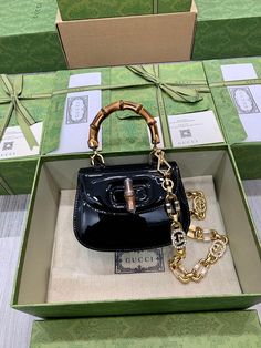 Size: 17cm*12.5cm*8cm It comes with Dust box, Care manual, Tag, and Paper bag. High-end Pouch Bag For Gift, Designer Handheld Satchel As Gift, Handheld Shoulder Bag With Original Box As Gift, High-end Top Handle Bag As Gift, Designer Handheld Bag As Gift, Designer Handheld Bag As A Gift, Gift Box Bag With Original Box In Pouch Shape, Gift Top Handle Shoulder Bag With Original Box, Designer Black Satchel For Gift