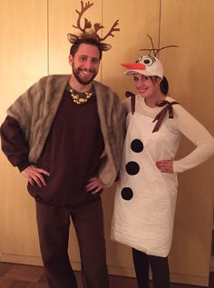 a man and woman are dressed up as snowman and frozen queen for the holidays