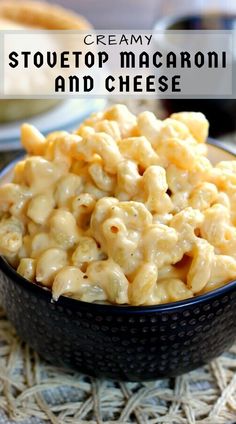 macaroni and cheese in a black bowl with the words, the best stovetop mac'n cheese