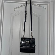 Black Silver Hardware Turn Lock Opening Zip Around Bottom Compartment Long 21” Drop Removable Strap Handle Chain Strap Can Be Worn Shoulder Strap Or Crossbody Faux Leather Croc Embossed Nwt Luxury Black Box Bag With Metal Hardware, Chic Formal Box Bag With Branded Hardware, Formal Chic Box Bag With Branded Hardware, Chic Crossbody Box Bag With Branded Hardware, Black Satchel With Chain Strap For Office, Black Rectangular Satchel With Chain Strap, Evening Satchel With Chain Strap And Square Shape, Black Satchel With Metal Hardware For Evening, Black Rectangular Box Bag With Metal Hardware