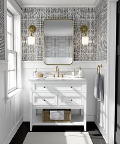 a bathroom with two sinks and a large mirror on the wall next to a window