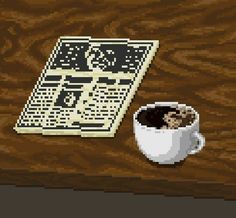 a cup of coffee next to a piece of paper on a wooden table with an image of a crossword