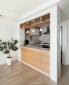 the kitchen is clean and ready to be used as a living room or dining area