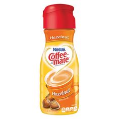 nestle coffee mate hazelnut liquid on a white background