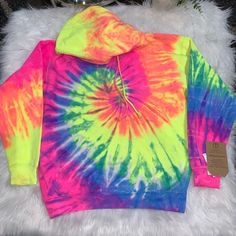 Trendy Tie Dye Hoodie!!! Very Bright Colors. Measurements: Pit To Pit 22” Shoulder To Hem 26” Small Imperfection With Dye On Sleeve Rainbow Casual Winter Hoodie, Casual Winter Rainbow Hoodie, Trendy Oversized Yellow Hoodie, Casual Rainbow Hoodie For Streetwear, Rainbow Long Sleeve Hoodie For Winter, Rainbow Long Sleeve Winter Hoodie, Rainbow Long-sleeve Winter Hoodie, Yellow Long Sleeve Hoodie For Spring, Spring Yellow Long Sleeve Hoodie