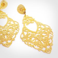 Feel the power of existence with our stunning French Drop Earrings. At three and a half inches long, these elegant earrings are perfect for catching attention and making a statement. Made with 18k gold overlay and hypoallergenic materials, they are not only beautiful but also safe for sensitive skin. Trust in the high-quality and durability of our waterproof and water-resistant design, comparable to fine gold and gold-filled jewelry. Add a touch of style and luxury to your collection with Donna Elegant Gold Clip-on Earrings As Gift, Elegant Gold Clip-on Earrings For Gift, Elegant Gold Clip-on Plug Earrings, Gold-plated Clip-on Earrings, Gold Clip-on Chandelier Earrings For Formal Occasions, Hypoallergenic Gold Drop Clip-on Earrings, Gold Single Clip-on Earring As A Gift, Gold Clip-on Bridal Drop Earrings, Elegant Gold Clip-on Chandelier Earrings