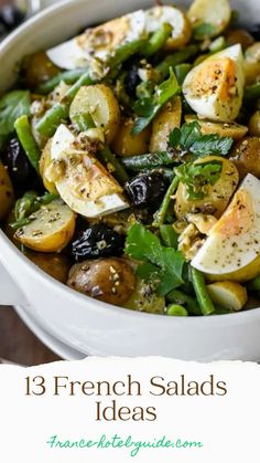 a white bowl filled with potatoes and other vegetables