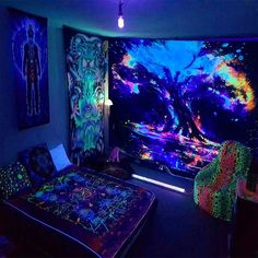 a bed room with a neatly made bed and colorful lights on the wall behind it