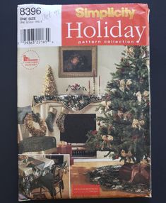 a magazine cover with a christmas tree in the corner and other decorations on the table