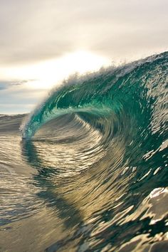 an ocean wave is shown with color swatches to match the water's colors