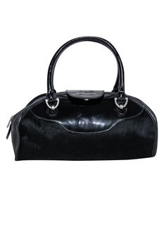 Look stylish no matter the occasion with the Dolce & Gabbana handbag. Crafted from black patent leather and luxurious calf hair, this y2k-inspired handbag pairs perfectly with your favorite heel boots and a chic jacket. Elevating your look with star power! Made in Italy Patent Leather and Calf hair Snap button closure Top zipper One interior zipper pocket Minor blemishes on patent leather Staining on lining Patchy calf hair on back Height 7.5" Width 11.5" Depth 3" Handle drop 4.5" Elegant Glossy Finish Tote Bag, Elegant Bags With Glossy Finish And Double Handle, Elegant Glossy Finish Shoulder Bag For Travel, Elegant Double Handle Bags With Glossy Finish, Designer Glossy Finish Bags For Party, Designer Glossy Finish Party Bags, Designer Party Bags With Glossy Finish, Evening Bags With Glossy Finish And Double Handle, Designer Patent Leather Shoulder Bag For Formal Occasions