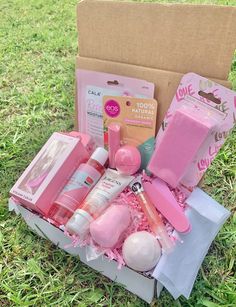 an open box with pink items in it