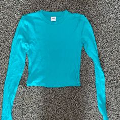 Perfect Condition Nwot Tna Baby Tee. Worn Only Once Blue Crew Neck Top For Fall, Blue Long Sleeve Trendy T-shirt, Trendy Blue Long Sleeve T-shirt, Fitted Blue Cotton Top, Blue Stretch T-shirt For Fall, Blue Fitted Basic Tops, Fitted Blue Basic Tops, Light Blue Stretch Basic Top, Blue Stretch Crew Neck Top