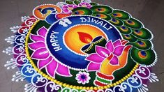 a colorful rang art design with peacocks and flowers on the ground for diwali